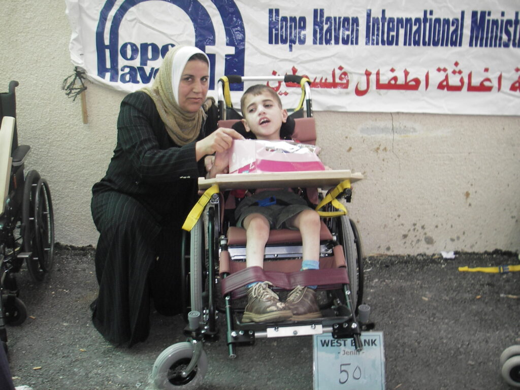 Mother and son with new wheelchair