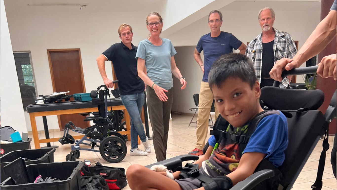 Boy excited about his new wheelchair