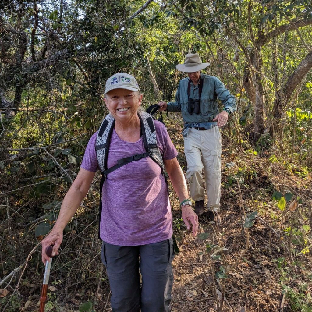 Couple hiking on a ROC your vacation